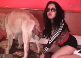 Dog cums in a wide opened mouth