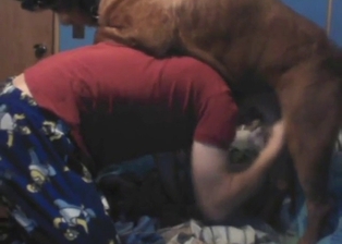 Dude is going to get humped by his brown dog