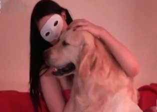Dog licks masked female slut